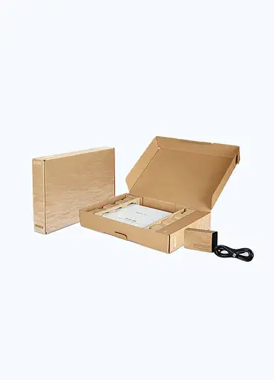 Two light brown corrugated cardboard boxes for electronics - one closed and one open showing an electronic device with protective inserts