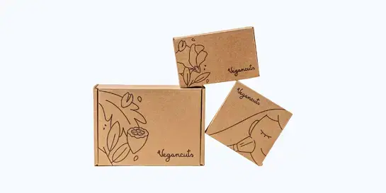Stack of Vegancuts subscription boxes with botanical designs