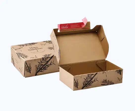Two custom-branded cardboard mailer boxes with bamboo leaf designs